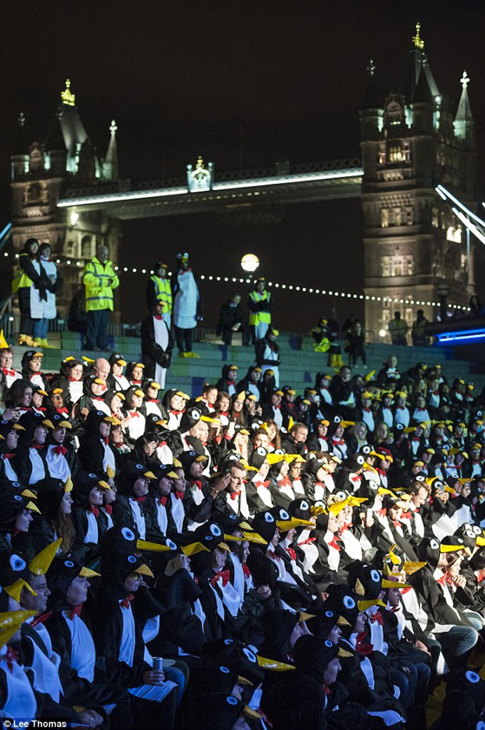 Record-breakers: 373 people dressed as penguins gathered near Tower Bridge to be counted by Guinness