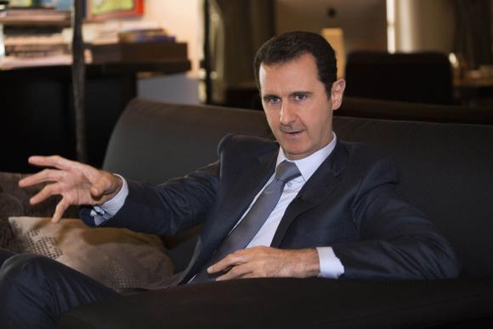 Chính quyền Tổng thống Bashar al-Assad đang lo Iran ngừng hỗ trợ nếu giá dầu tiếp tục giảm. Ảnh: Reuters