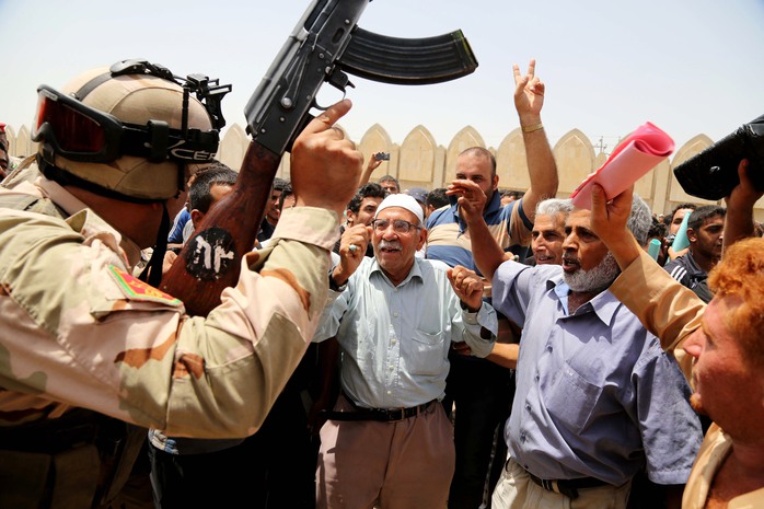 CLICK IMAGE for slideshow: Al-Qaida-inspired insurgents gaining ground in Iraq. (AP Photo/ Karim Kadim)