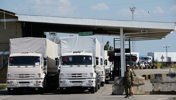 Russias humanitarian aid convoy have been cleared by the Russian customs at the Donetsk checkpoint and are headed for Ukraine.