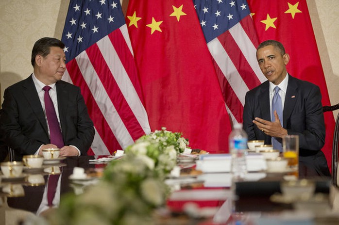 Tổng thống Mỹ Barack Obama và Chủ tịch Trung Quốc Tập Cận Bình trong cuộc họp hôm 24-3 tại Hà Lan. Ảnh: AP