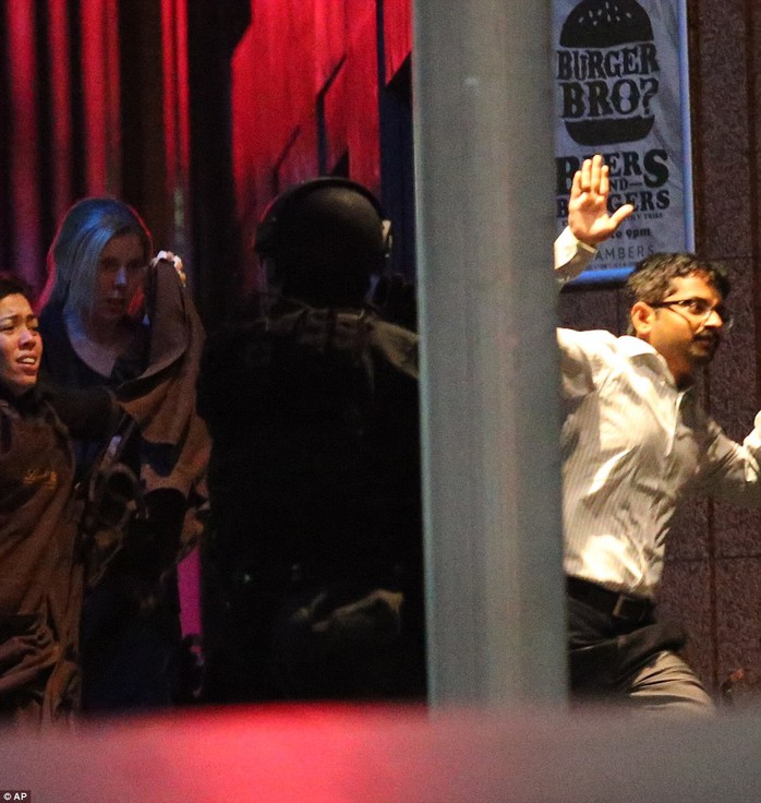 Siege over: Police raided the cafe in central Sydney early Tuesday, bringing a dramatic end to a 17-hour siefe. The raid came moments after some hostages fled the Lindt cafe after more than 16