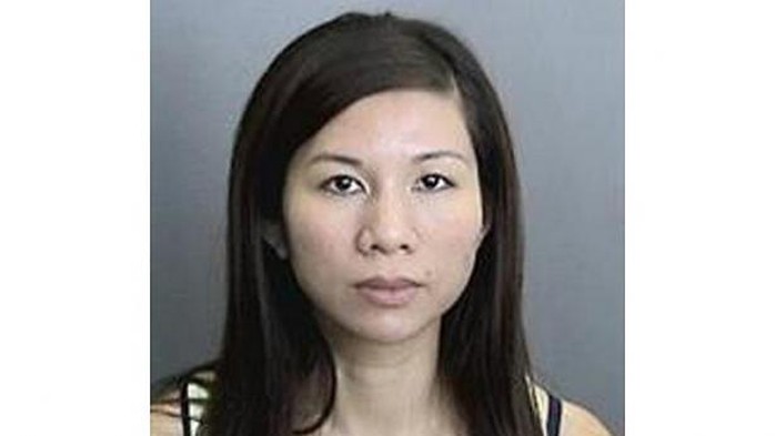 Tracy Le, is pictured in this undated police handout photo courtesy of the Anaheim Police Department. A Southern California couple have been arrested for child endangerment over accusations they kept their 11-year-old severely autistic son in a metal cage, police said on July 2, 2014. -- PHOTO: REUTERS 