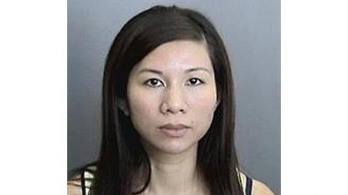 Tracy Le, is pictured in this undated police handout photo courtesy of the Anaheim Police Department. A Southern California couple have been arrested for child endangerment over accusations they kept their 11-year-old severely autistic son in a metal cage, police said on July 2, 2014. -- PHOTO: REUTERS 