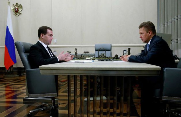 Russian Prime Minister Dmitry Medvedev, left, meets with Gazproms Chief Executive Alexei Miller in Moscow, Russia, Thursday, April 3, 2014. Russian gas giant Gazprom on Thursday urged Ukraine to pay its debt, and announced a 70 percent rise in the charge for future supplies. Photo: Dmitry Astakhov, AP / RIA Novosti Russian Government