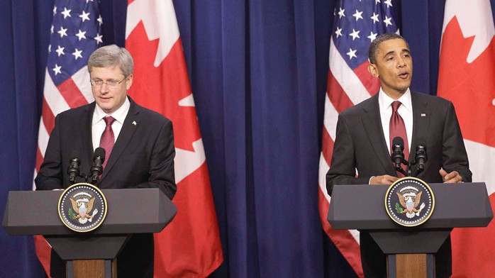 Ông Obama (phải) thua độ Thủ tướng Canada một thùng bia. Ảnh: Overrant