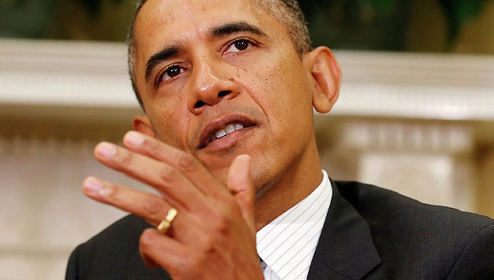 Tổng thống Mỹ Barack Obama công bố quyết định “tăng cường và mở rộng” các biện pháp trừng phạt Nga. Ảnh: Reuters