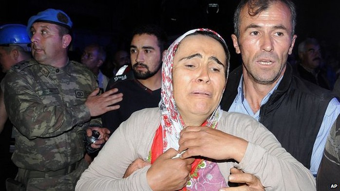 Relative waits for news of trapped miners. 13 May 2014