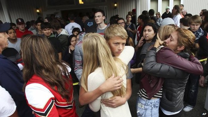 The students embraced after they evacuated the school