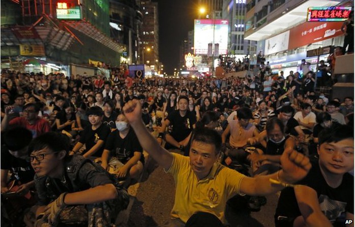 Thousands of pro-democracy protesters gather at Hong Kongs Mong Kok district Monday, Sept. 29, 2014