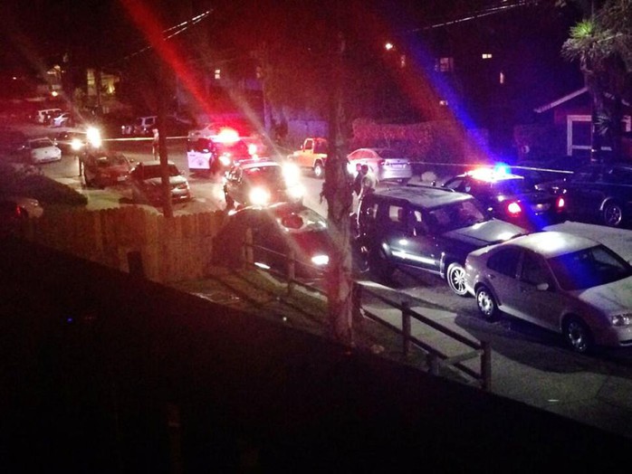 Police surround crashed vehicle in Isla Vista, Calif. following shooting near University of California Santa Barbara.