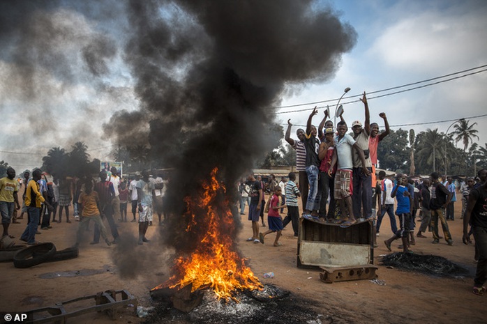 In this photo provided on Friday, Feb. 14, 2014 by World Press Photo, the 2nd prize in the General News Stories category of the 2014 World Press Photo Contes...