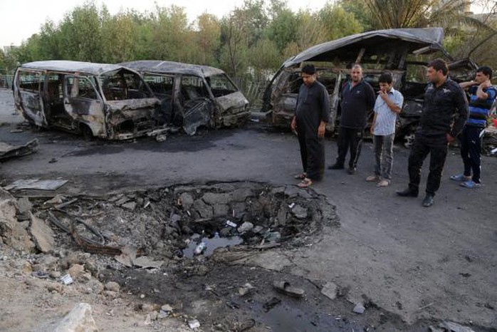 Thủ đô Baghdad xảy ra các vụ tấn công lẻ tẻ hôm 18-6. Ảnh: Reuters