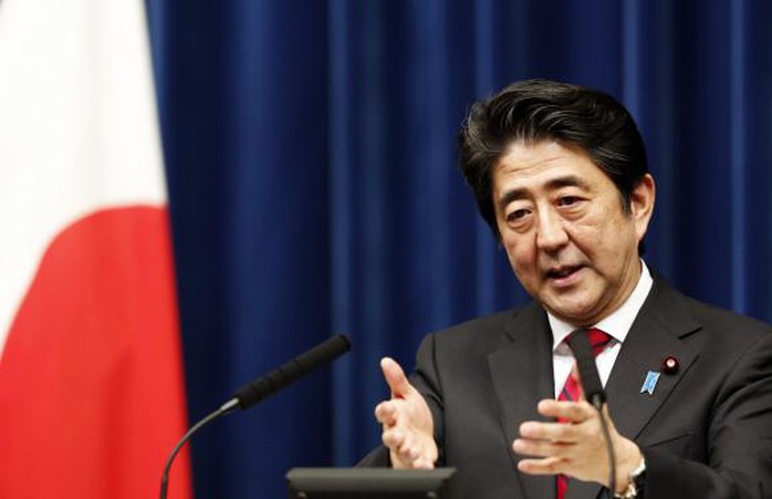 Thủ tướng Shinzo Abe của Nhật Bản tố Trung Quốc có hành động xâm lược giống Nga. Ảnh: Reuters