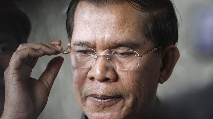 Cambodias Prime Minister Hun Sen has vowed to continue to rule even if opposition MPs dispute his election victory.