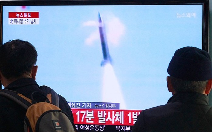 People watch TV reporting North Koreas missile test at Seoul Railway Station in Seoul