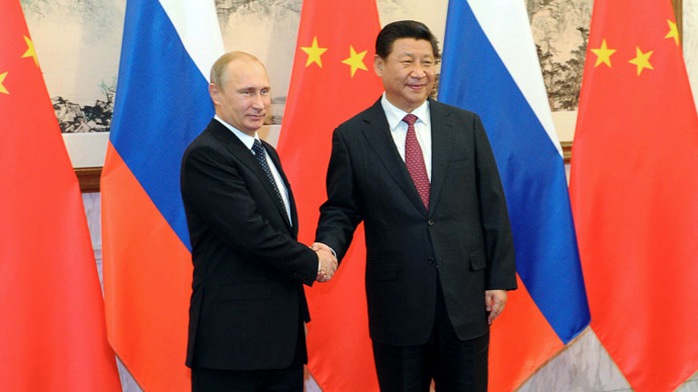Russia&apos;s President Vladimir Putin shakes hands with his China&apos;s counterpart Xi Jinping (RIA Novosti/Mikhail Klimentiev)
