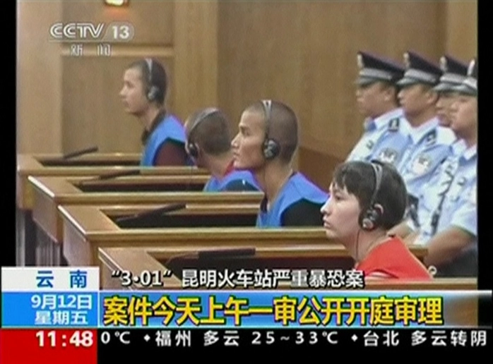 Tòa xét xử các nghi phạm trong vụ tấn công nhà ga ở thành phố Côn Minh. Ảnh: Reuters