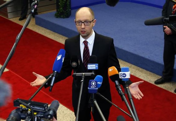 Thủ tướng lâm thời Ukraine Arseniy Yatsenyuk và EU đã ký kết hiệp định liên kết tại Brussels. Ảnh: Reuters