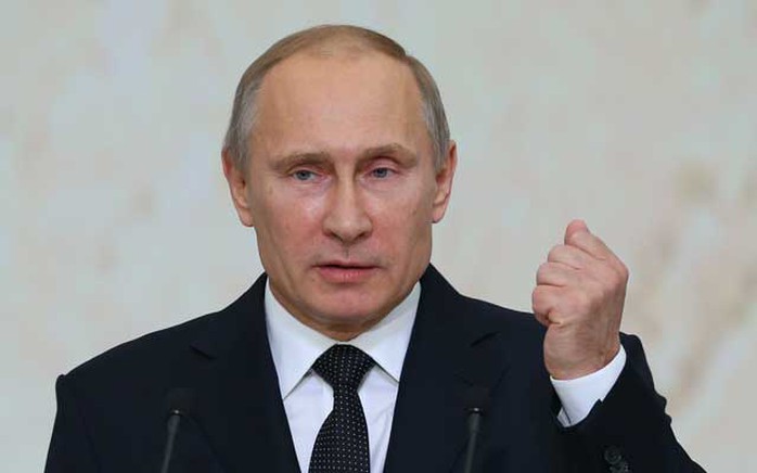 Tổng thống Putin hôm 6-8 ký sắc lệnh cấm hoặc hạn chế nhập khẩu sản phẩm nông nghiệp từ Mỹ và EU để đáp trả lệnh trừng phạt. Ảnh: ZUMA Press