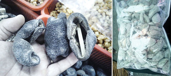 Banh lông khô (còn gọi là sâm dừa, địa biển) xuất xứ từ Phú Quốc (Kiên Giang) bày bán tại chợ Bình Tâylúc cao điểm có giá 1 - 2,2 triệu đồng/kg - Ảnh: Hoàng Lộc