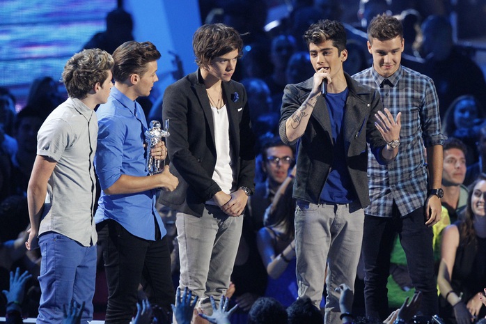 One Direction chiếm cả 5 vị trí trong tốp 10 nghệ sĩ Anh dưới 30 tuổi giàu có nhất. Ảnh: Reuters