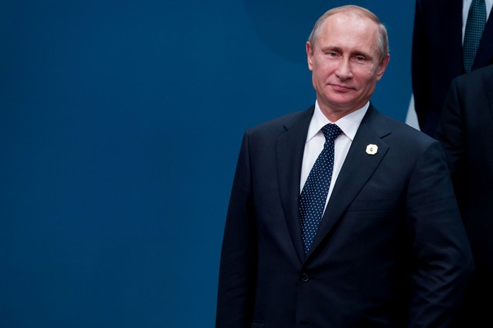 Tổng thống Nga là lãnh đạo đầu tiên rời G20. Ảnh: Bloomberg
