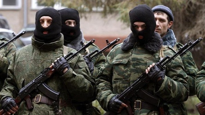 Members of a pro-Russian self defence unit stand in formation as they take an oath to Crimea government in Simferopol.