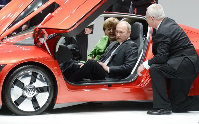 Angela Merkel and Russian President Vladimir Putin at the Hanover Trade Fair on April 8. The chancellor may be forced to make sanctions decisions that could negatively effect German businesses.