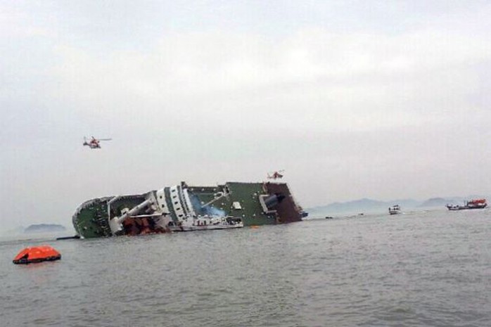 A South Korean passenger ship that has been sinking is seen at the sea off Jindo on Wednesday. -REUTERS/Yonhap