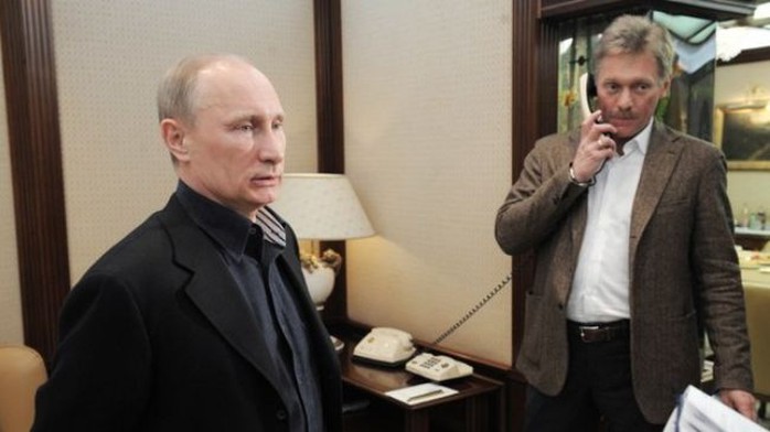 Russian President Vladimir Putin (L) and his press secretary Dmitry Peskov, Interfax Picture 