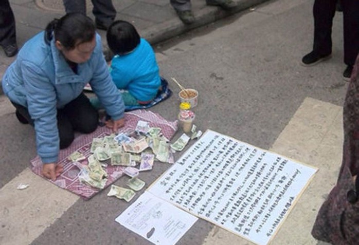 An old woman selling grandson on a street in Wuhan