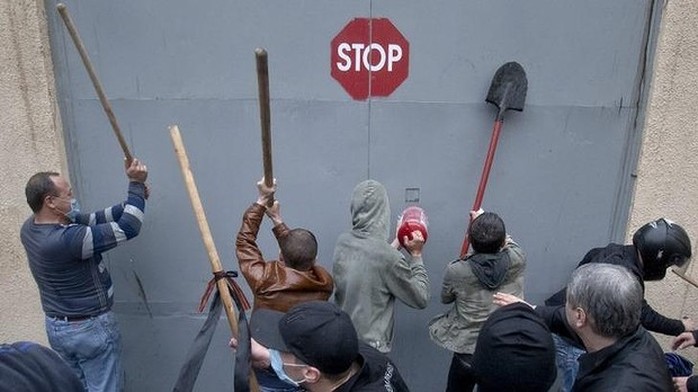 Pro-Russian militants storm the police building in Odessa prior to the release of 67 of their fellows detained inside.