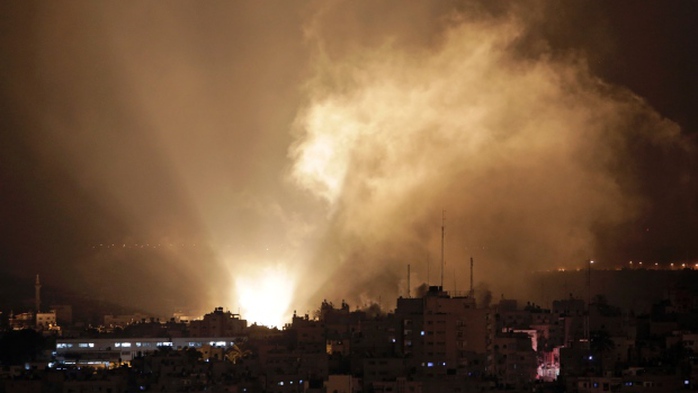 Smoke rises above Gaza City as Israel continued its aerial bombardment early Tuesday morning local time. 