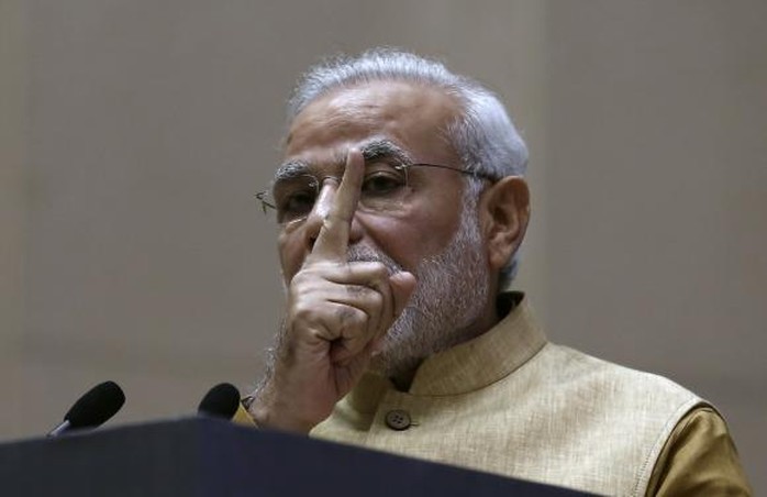 Prime Minister Narendra Modi gestures as he speaks during the launch of Make in India campaign in New Delhi September 25, 2014. REUTERS/Adnan Abidi