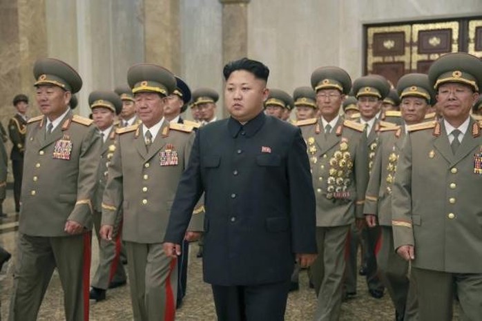 North Korean leader Kim Jong Un (4th R) visits the Kumsusan Palace of the Sun to pay tribute to founding President Kim Il Sung and former leader Kim Jong Il to mark the 61st anniversary of the victory of the Korean people in the Fatherland Liberation War, in this photo released by North Koreas Korean Central News Agency (KCNA) in Pyongyang July 27, 2014. REUTERS/KCNA