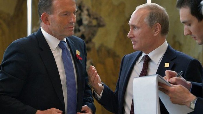 Tony Abbott speaks to Vladimir Putin in Beijing on Tuesday.