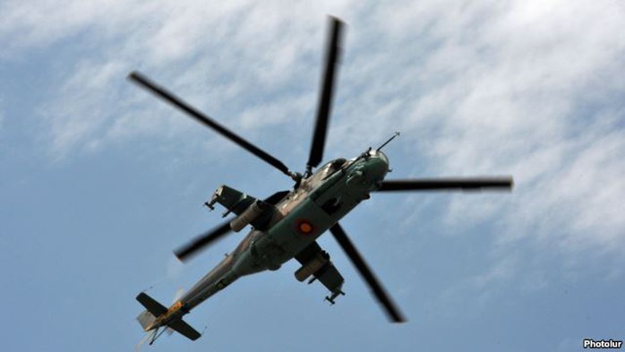 An Armenian Mi-24 combat helicopter flies near Yerevan. (file photo)