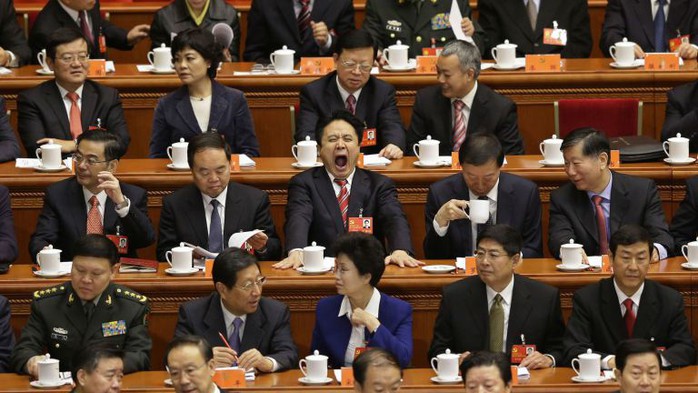 http://img.qz.com/2014/06/chinese-official-yawning-web1.jpg?w=768