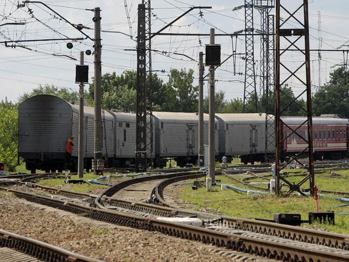 Chuyến tàu chở thi thể nạn nhân đến TP Kharkov - Ukraine hôm 22-7. Ảnh: AP