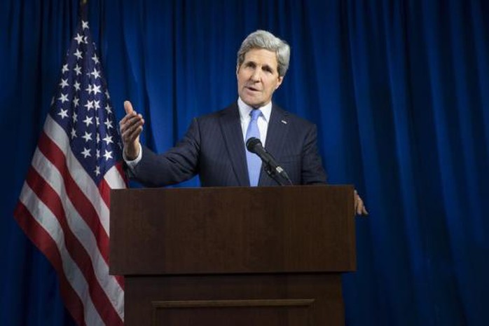 Ngoại trưởng Mỹ John Kerry phát biểu trong cuộc họp ở London hôm 16-12. Ảnh: Reuters