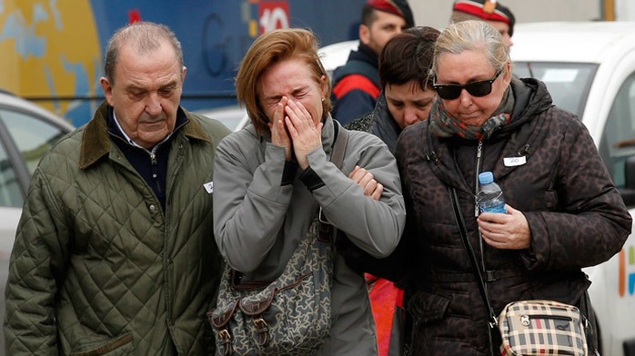 Family members of passengers feared killed in Germanwings plane crash react at Barcelonas El Prat airport March 24, 2015.(Reuters / Albert Gea )