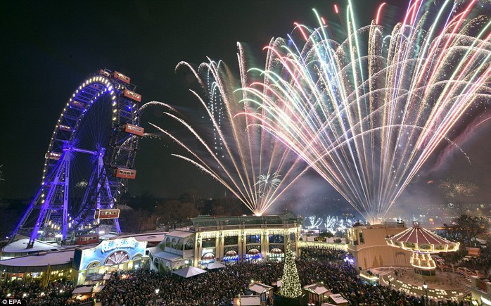 The New Year started with a bang as an explosion of light from some 12,000 fireworks - weighing a combined 15 tons - filled the sky above Londons South Bank