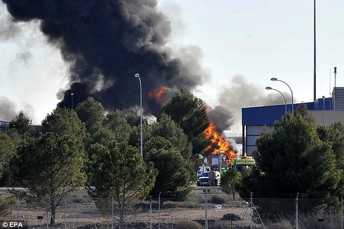 Smoke rises after a Greek F-16 aircraft crashed at Los Llanos air base in Albacete, eastern Spain