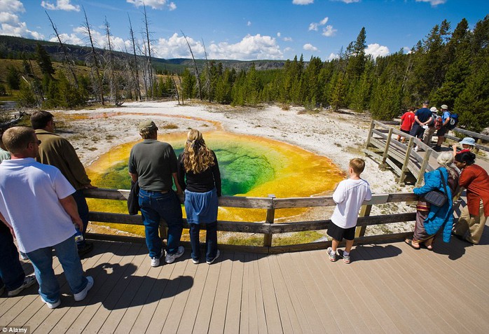 Over three million people enjoy the Yellowstone National Park annually, spans an area of 3,468.4 square miles, comprising lakes, canyons, rivers and mountain ranges
