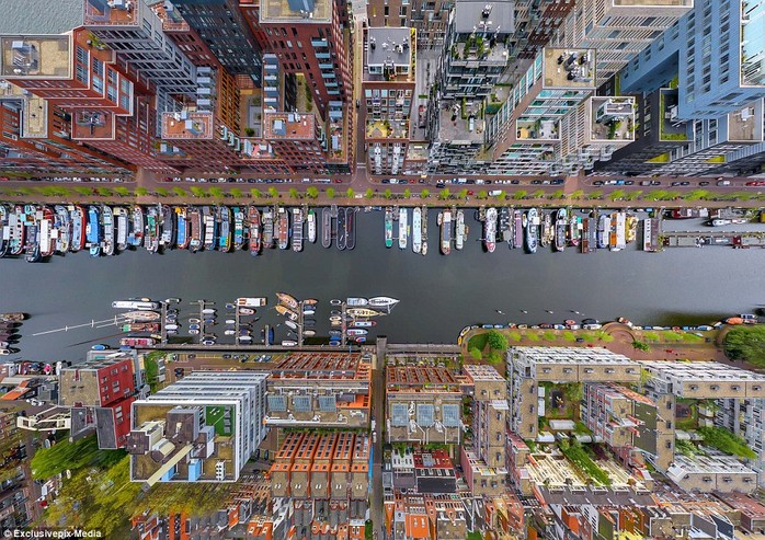 The Westerdok Disctrict in Amsterdam: Boats line the canal in Hollands capital city in this beautiful aeiral photo