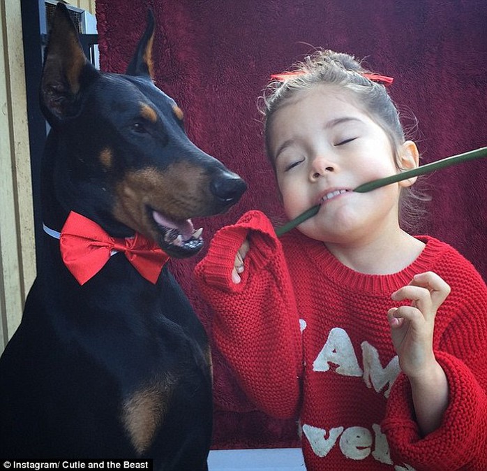 True love: They might seem like an unlikely pair, but Siena and Buddha are the best of friends