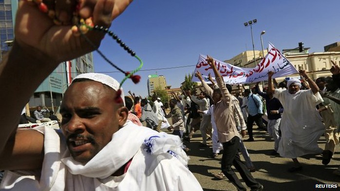 Muslims shout slogans against France and call for its apology after attending Jumma prayer in Khartoum on 16 January  2015