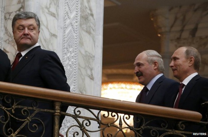 Ukrainian President Petro Poroshenko is followed by Belarusian President Alexander Lukashenko and Russian President Vladimir Putin in Minsk, 11 February