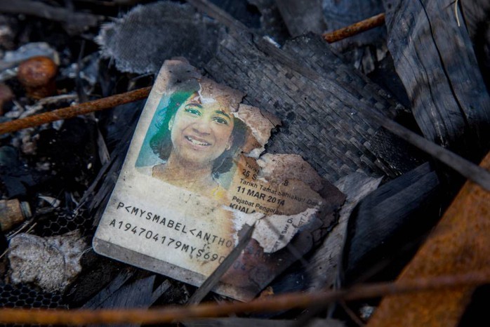 Haunting passport picture among hundreds of pieces of debris at MH17 crash site